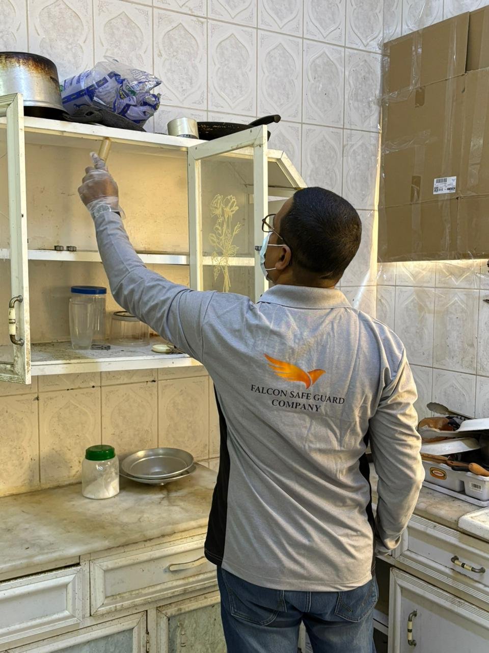 Falcon Safeguard technician performing termite control treatment in Dammam